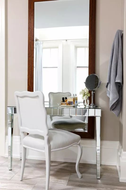 vanity table with white chair